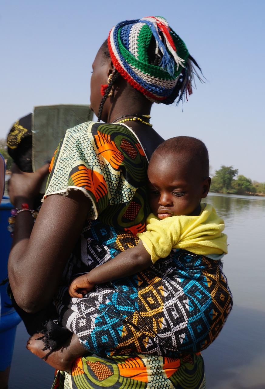 woman, child, carrying-302551.jpg